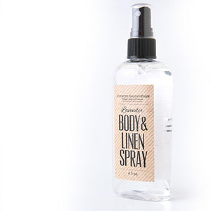 Clear plastic bottle with black spray top of Lavender Body and Linen Spray