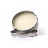 Open round metal tin,sitting in lid, showing creamy Lavender Eucalyptus Beard Balm