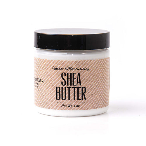 Clear round jar with black screw on top of white shea butter lotion